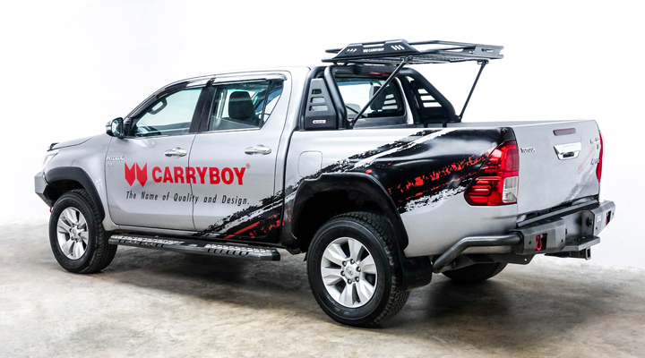 Steel Roll Bar and Black Roof Rack — Toyota Hilux Revo