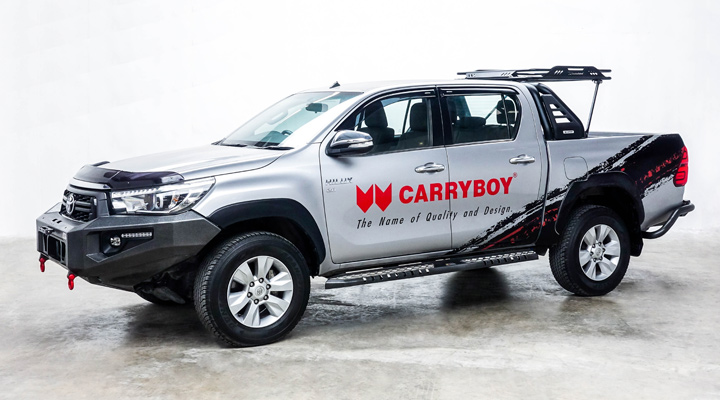Steel Roll Bar and Black Roof Rack — Toyota Hilux Revo