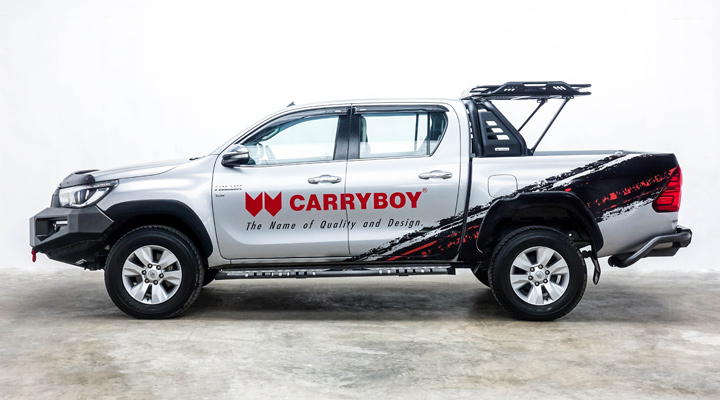 Steel Roll Bar and Black Roof Rack — Toyota Hilux Revo